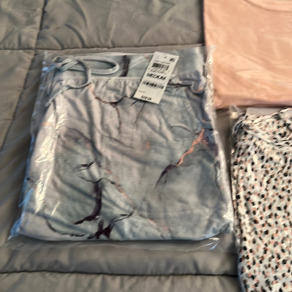 3 piece pajamas. 2 NWT Alfani lounge shorts and 1 NWT Alfani t shirt size M